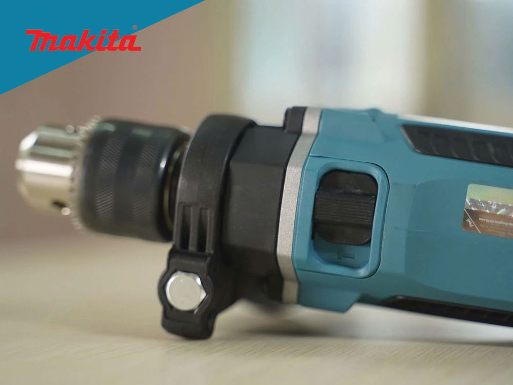 Máy khoan búa Makita M8103KX2B 26 phụ kiện